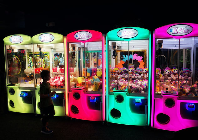 Claw machine rental Singapore — LED claw machine at corporate event