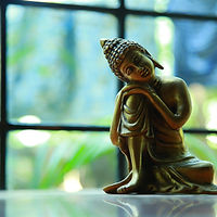 Buddha, Acupuncture clinic room, window with Buddha figure