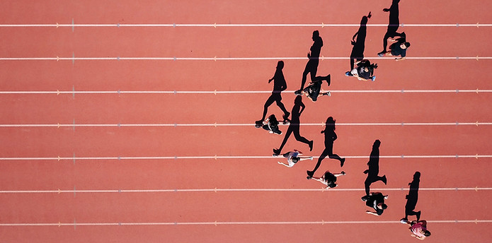Aerial Image of People Racing - Representing Getting ahead of the competition - Partnership Schemes for Accountants - R&D Tax Credit Referrals
