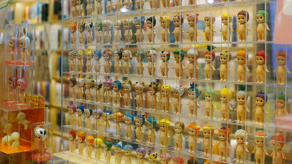 Toy Museum Colmar, a playful wall of quirky collectible dolls steals the show!