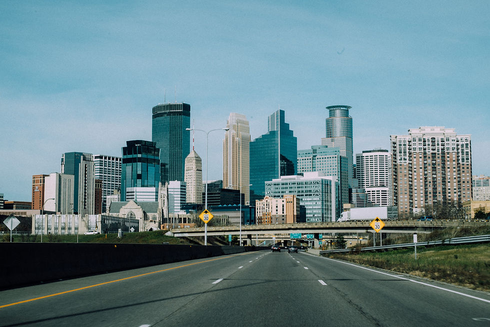 Downtown Minneapolis skyline from a highway