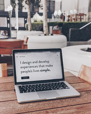Writing on a Computer Screen Saying I Design and Develop Experiences That Make People's Loves Simple