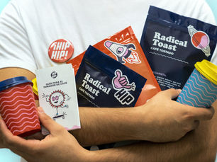 Radical Toast coffee packaging and branded merchandise.