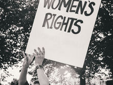 holding sign protect womens rights