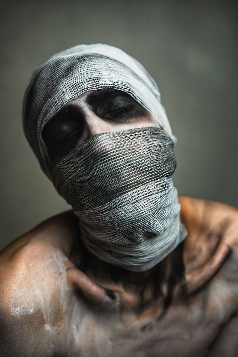 a person with sooty bandages