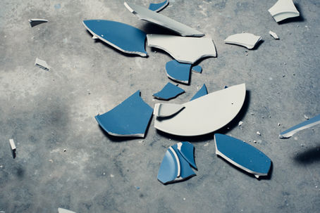 A broken plate on the floor
