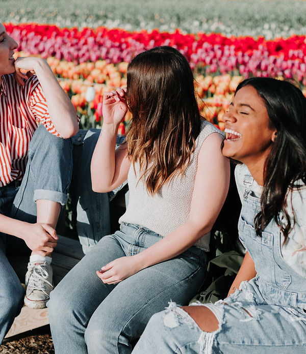 3 young people chatting and laughing