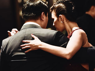 a couple dancing salsa together
