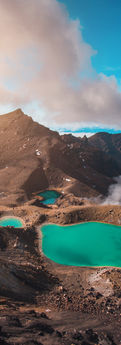 Emerald-green lake in a volcanic crater landscape in Tongariro