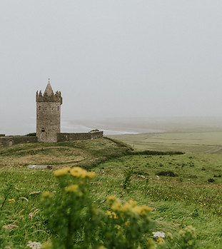 A castel on the hill and near a body of water