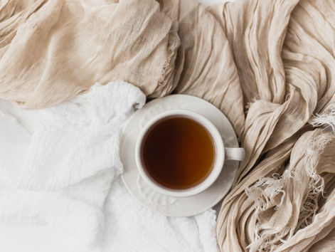 warm cup of tea on linen on a Sunday reset