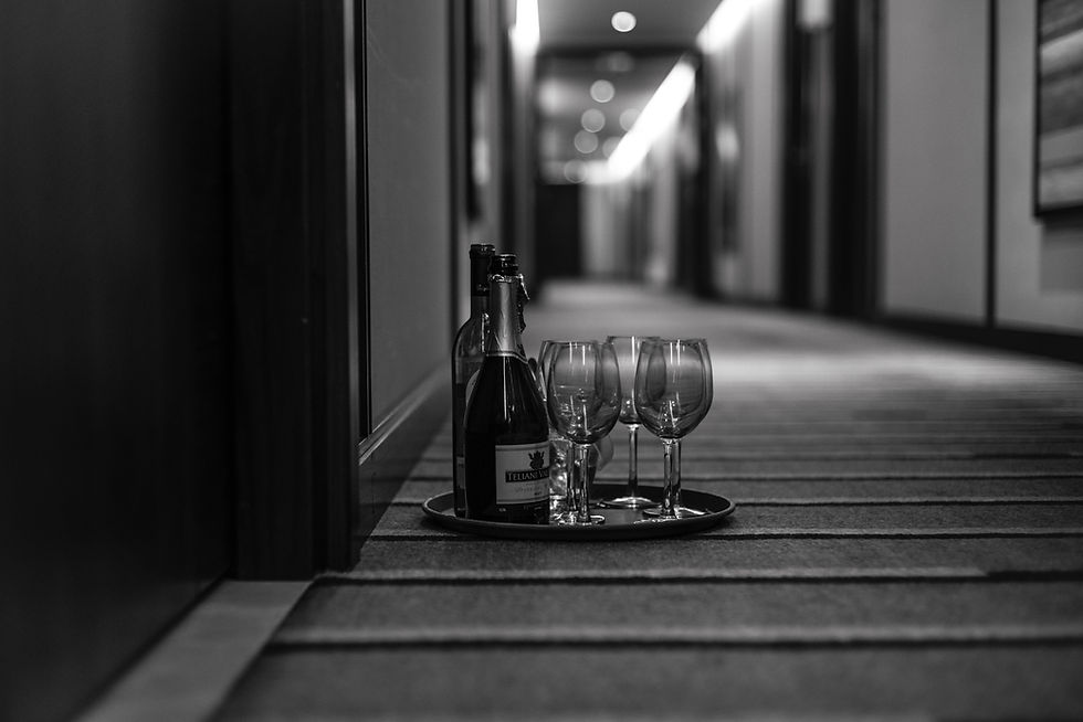 Elegant hotel corridor with wine glasses