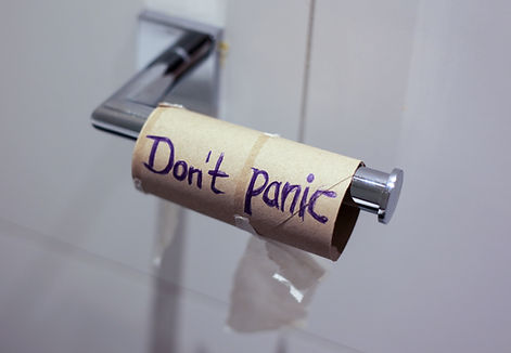 Picture of toilet tissue holder with the words "don't panic"- re anxiety re bladder or bowel issue