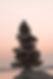 Rocks stacking on top of one another providing a sense of grounding of energy