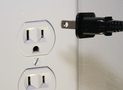 Electrical outlet with a plug