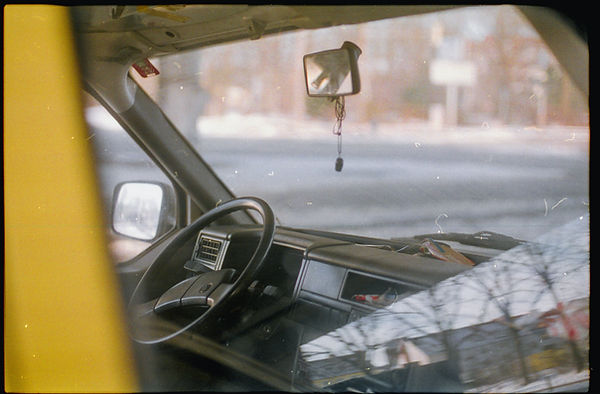 A car's view looking out through it's windshield.
