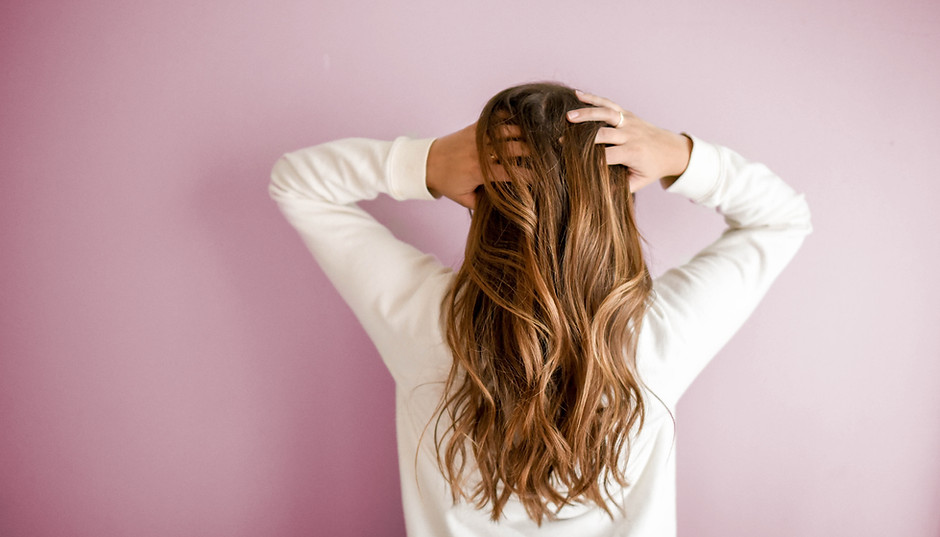 Woman with long hair.