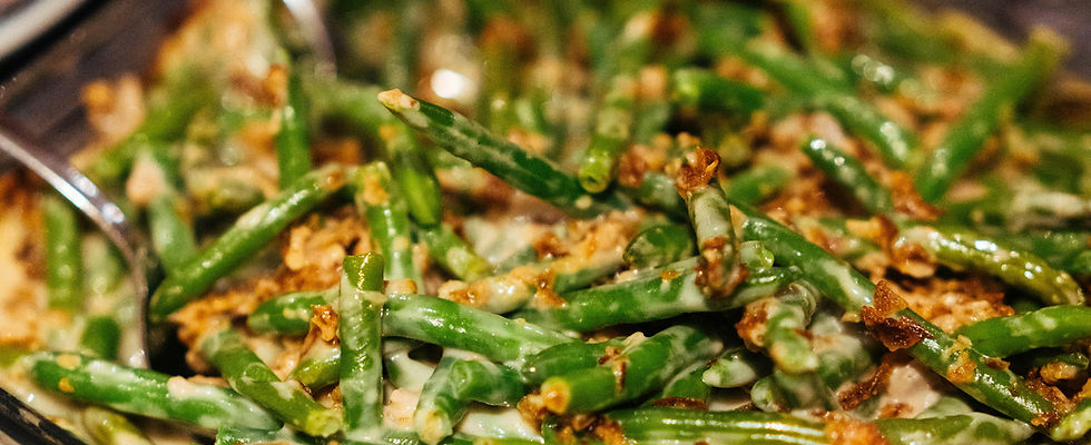 Southern green beans with bacon and onion, slow-simmered and topped with crispy onions