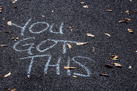 "You got" this written in chalk on the pavement