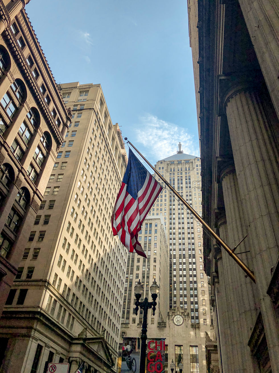USA flag hanging from a building
