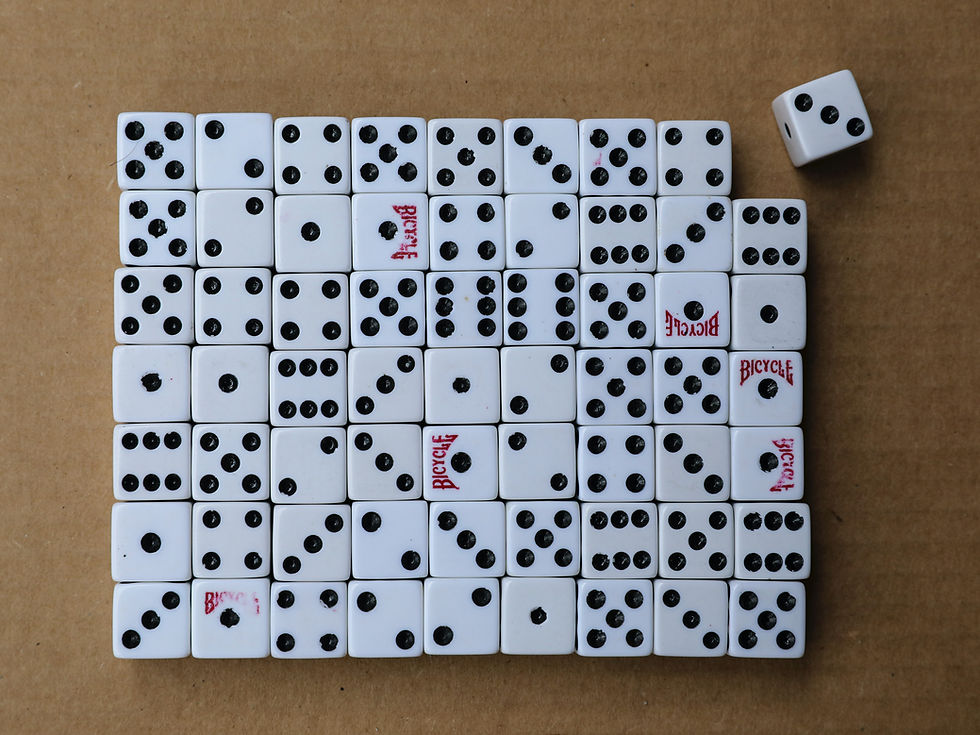 Dice lined up except on on the top right hand corner