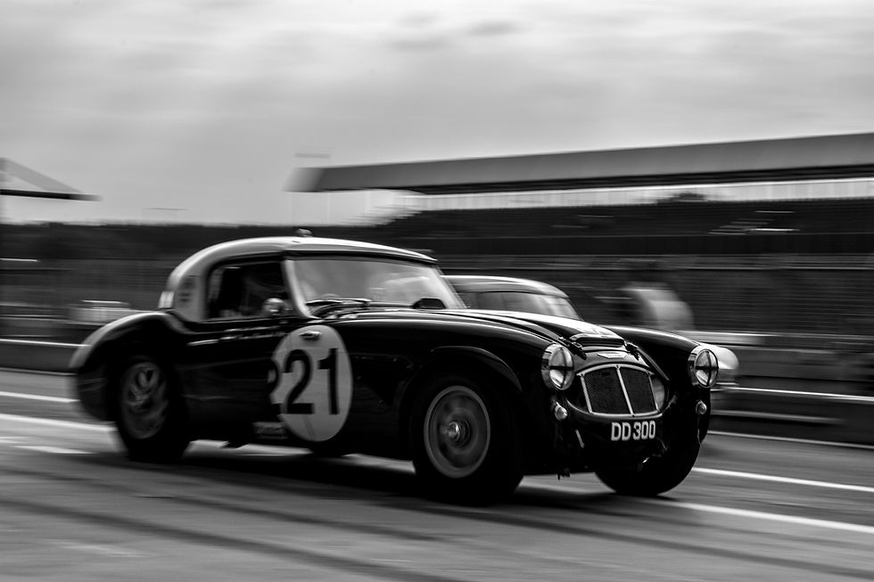 Black & white image of vintage racing car