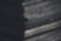 An image or Black Absolute granite slabs on top of eachother