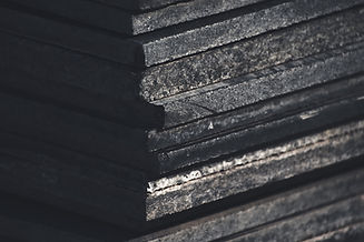Granite pieces stacked in a pile.