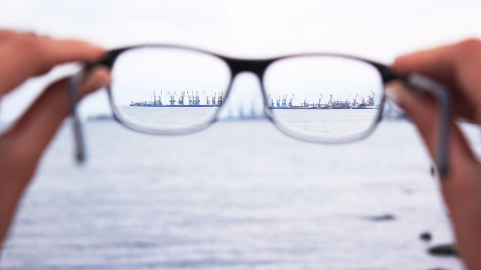 Looking over the water though a pair of glasses.