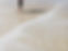 Image of person walking on the beach.