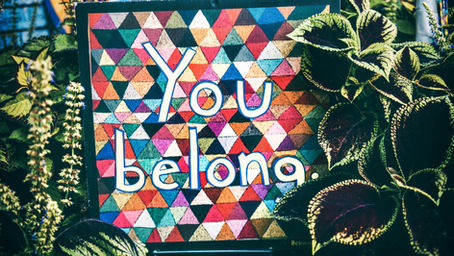 A sign saying "you belong." Identity Therapy