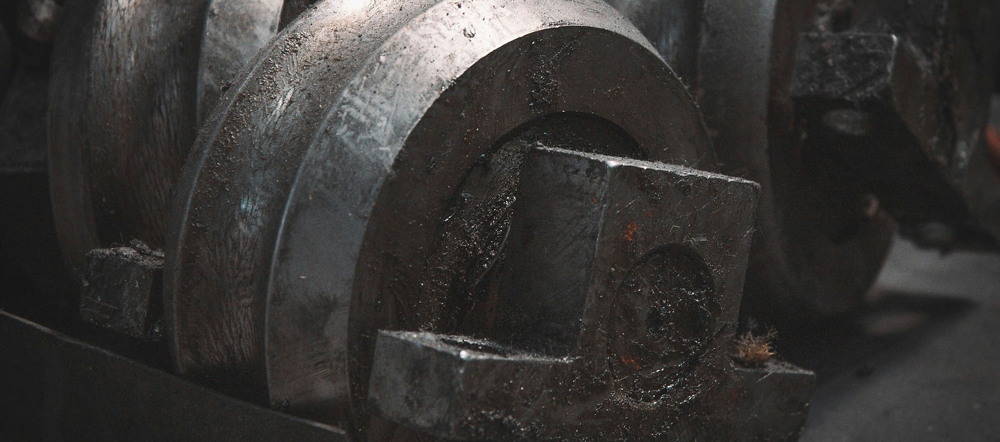 Close-up of heavy gym equipment – symbolising strength, discipline, and physical effort.