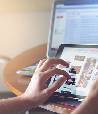 designer optimising website on tablet