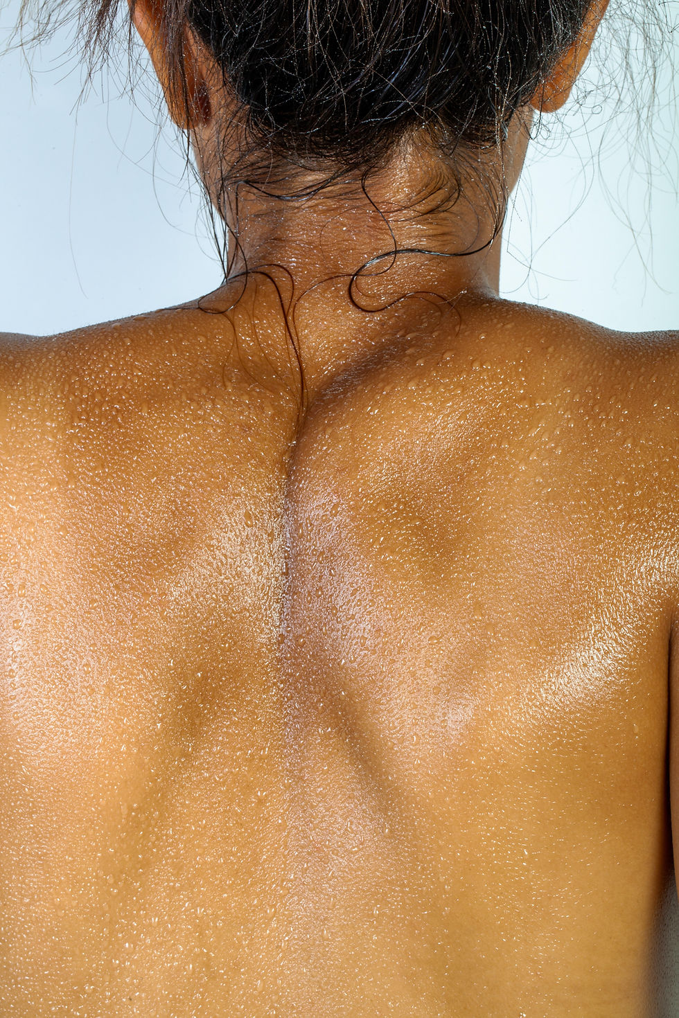 Why heat makes you feel more oily