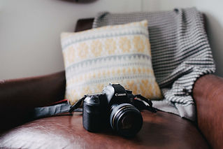camera sitting on sofa