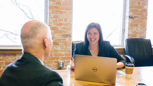 Business partners discussing partnership agreement