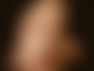 A man looking pained and turning his face, as though slapped.