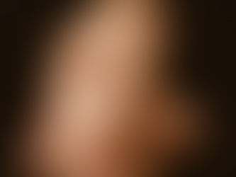 A man looking pained and turning his face, as though slapped.