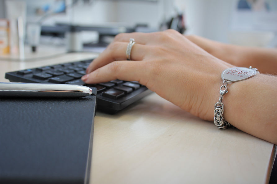 Women emailing on a computer