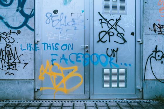Graffiti wall with a 'like this in Facebook' message tees up what's trending this July and the must know shifts to look out for
