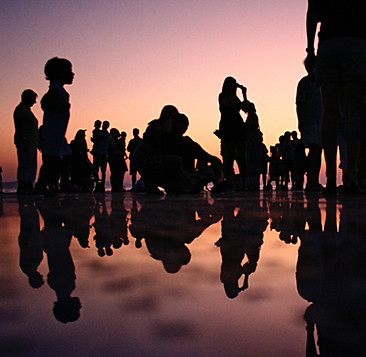 Group on the beach in sunset