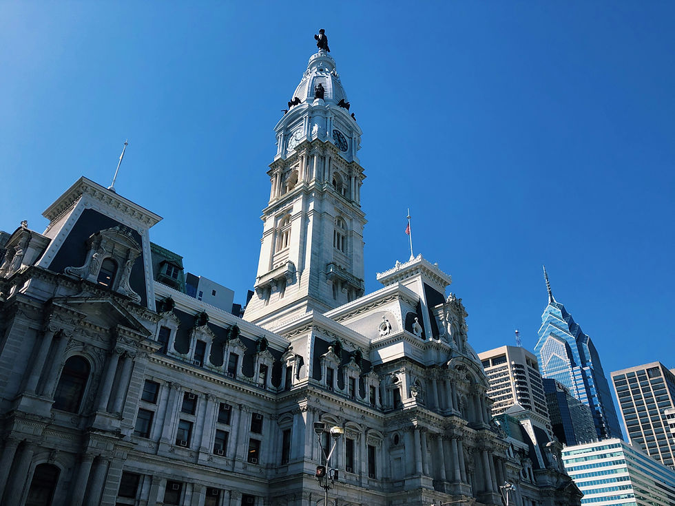 Jeffrey H. Penneys reviews legal documents with a client in a calm office setting, providing guidance and support after a Philadelphia personal injury accident.