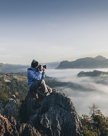 Photographer on mountain top