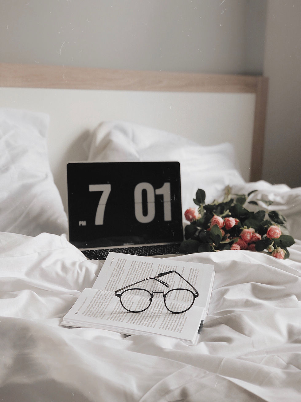 alarm clock on bed