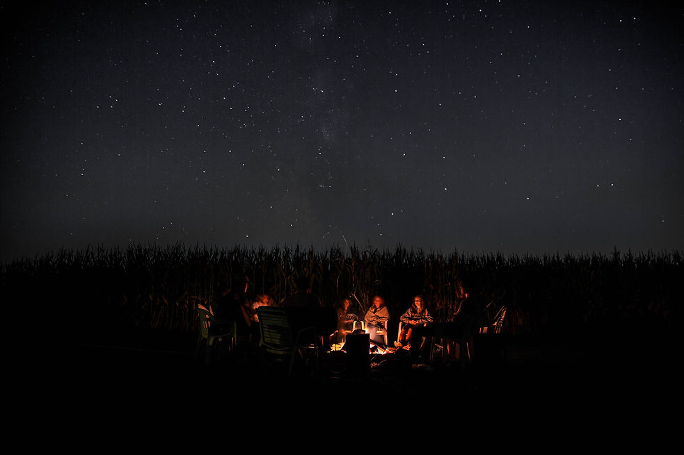 campfire in the backyard, bonfire with kids, camp under the stars, family time around the fire