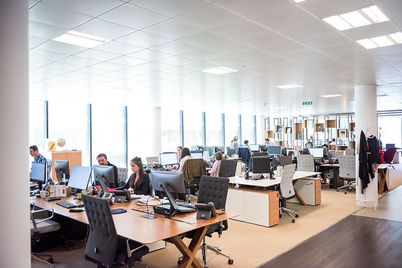 Employees in an office - Image by Arlington Research