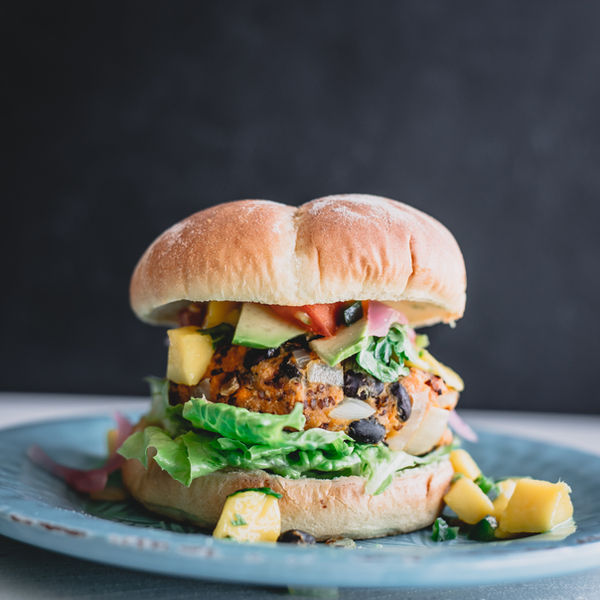 a burger with lettuce