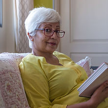 image of a lady reading a book, implying that we are careful with your time