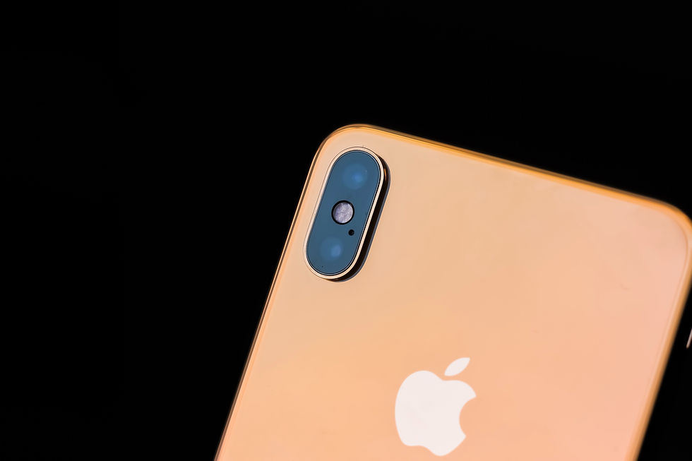 Close-up of gold iPhone camera – expert mobile phone camera repairs in Kent