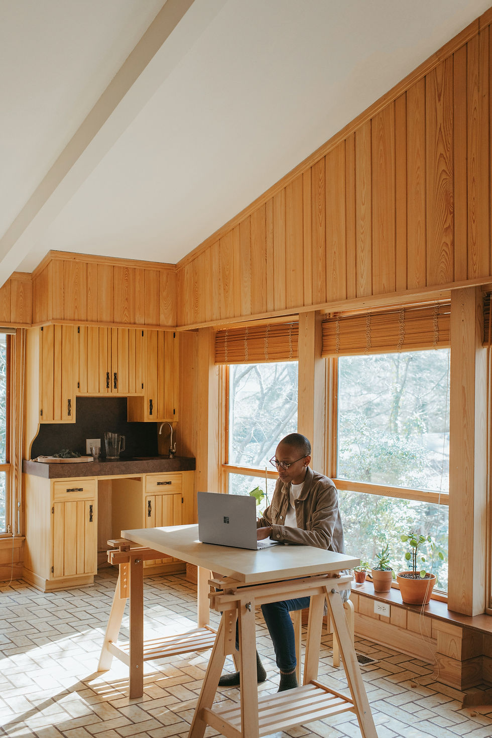Remote employee working from a cabin off a hot spot.
